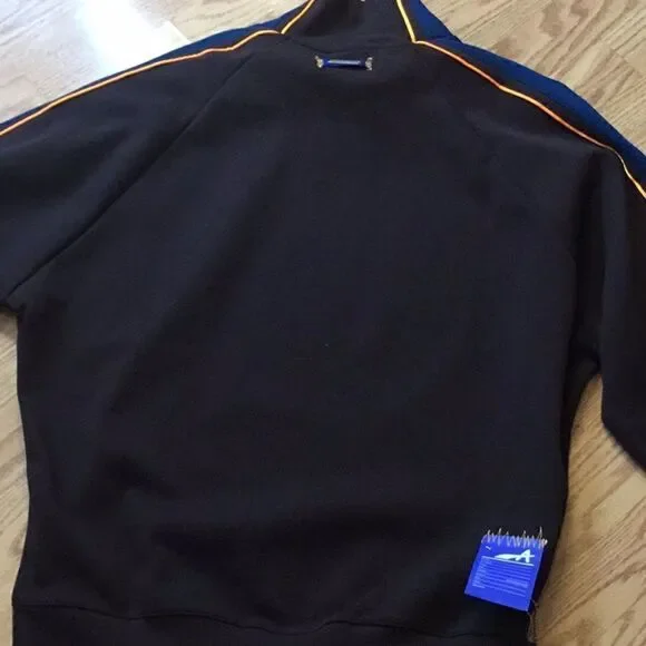 NWT PUMA sweatshirt in brown with blue & orange